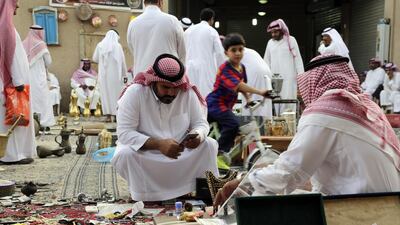 Inside the market’s twists and turns, Yemeni and Saudi merchants smile to visitors, eager to sell the fragrant incense that burns outside their stalls and fills the air with a strong musk.