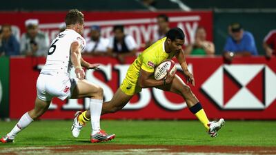 Australia’s Pama Fou scores a try against England during Day 1 of the Dubai Rugby Sevens. Australia won 12-5 but both sides progressed. Warren Little / Getty Images