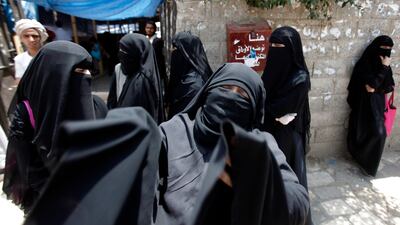 A woman reacts as she waits outside a makeshift clinic for news about her son, who was injured during clashes between anti-government protesters and security forces, in Sanaa September 19, 2011. Soldiers opposed to President Ali Abdullah Saleh exchanged ???