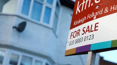 A sign advertising a house sale in London, where property prices went into decline in 2017 for the first time since 2009. Neil Hall/ EPA
