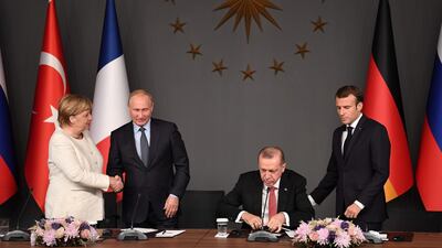 Russian President Vladimir Putin, German Chancellor Angela Merkel, Turkish President Recep Tayyip Erdogan and French President Emmanuel Macron during a summit to find an end to the war in Syria, in Istanbul, on October 27, 2018. AFP