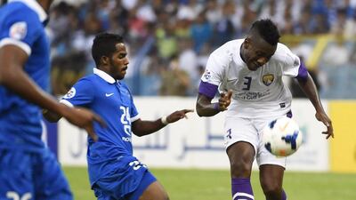 Asamoah Gyan, right, and his Al Ain teammates have their work cut out for them in the second leg of their Asian Champions League semi-final against Al Hilal. Fayez Nureldine / AFP