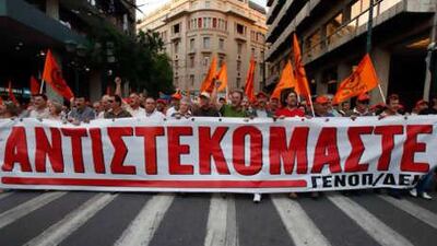 Public Power Corporation unionists holding a banner protest during a rally against government austerity measures in Athens on Monday.