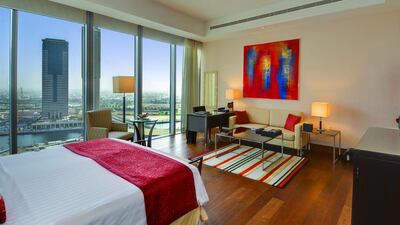 We like the punchy colour scheme of the interior, with its brightly coloured accents and artwork. Courtesy Better Homes