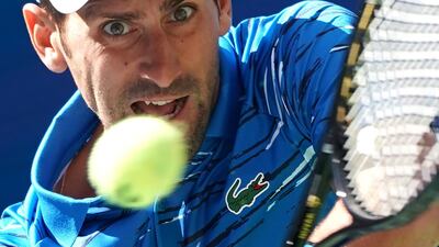 Novak Djokovic of Serbia warms up before playing Roberto Carballes Baena of Spain in their opening match at the US Open. AFP