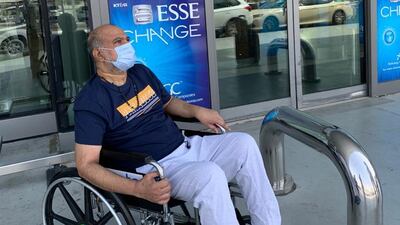 Tomichan Thomas at Dubai International Airport before flying out to meet his family in India.