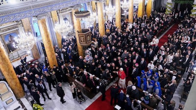 Pope Leo greets the congregation in the cathedral. AP