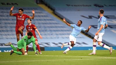 Manchester City's Raheem Sterling, second right, celebrates after his team's fourth goal. AP