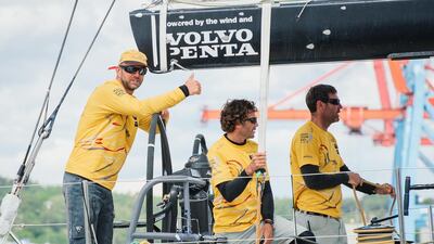 Abu Dhabi Ocean Racing skipper Ian Walker, left, flashes a thumbs up at the end of the round-the-world 2014/15 Volvo Ocean Race in Gothenburg, Sweden on Monday. Jonathan Nackstrand / AFP