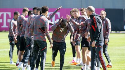 Bayern's Sadio Mané, centre, trains with teammates. AP