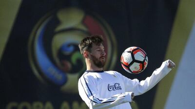 Argentina midfielder Lionel Messi bumps the ball with his chest during practice on Monday ahead of Tuesday's Copa America match against Bolivia. Ted S Warren / AP Photo / June 13, 2016