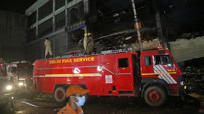 Many fire engines were at the scene late into the night. Reuters