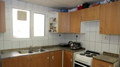 The kitchen is completely enclosed from the rest of the apartment, a rarity in Dubai. Pawan Singh / The National