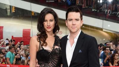 Actors America Olivo, left, and Christian Campbell attend the Mission Impossible — Rogue Nation New York premiere at Duffy Square in Times Square. Jamie McCarthy / Getty Images / AFP