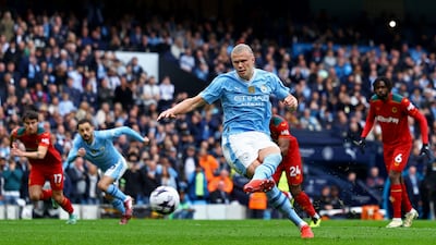 Manchester City's Erling Haaland scores their first goal from the penalty spot. Reuters
