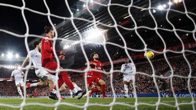 Liverpool's Mohamed Salah scores their second goal. Reuters