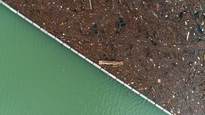 Waste floats on the Lim river near Priboj, Serbia. AP