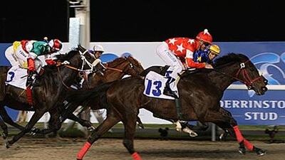 Red Desire, No 13, strides to victory in the Al Maktoum Challenge Round III on March 4.
