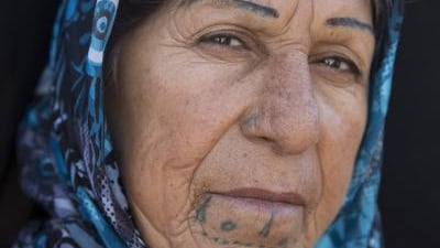 Noyle Muzlem, 55 from El Ajak village of Kobani. ‘It’s an old tradition. I don’t really like my tattoos.’