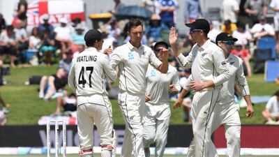 New Zealand's Tim Southee, centre, celebrates with teammates after taking the wicket of Jofra Archer. Reuters