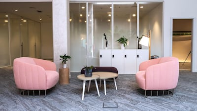 The space includes a socially-distant lounge area for people to work at.