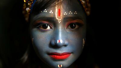 A child dressed as Krishna in Dhaka during Janmashtami festivities. Reuters