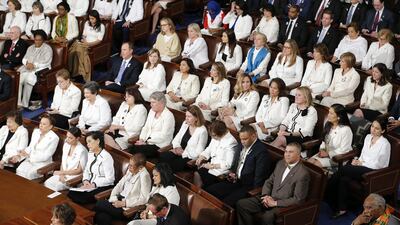 Democratic Representatives dressed in white on the floor of the House as US President Donald Trump delivers his second State of the Union address, 05 February 2019. EPA
