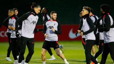 Liverpool's James Milner with teammates during training. Reuters