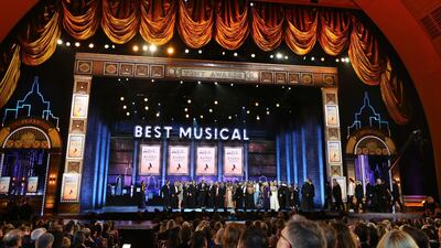 The cast and crew of 'The Band's Visit' accept the award for best musical at the 72nd annual Tony Awards. Michael Zorn / Invision / AP