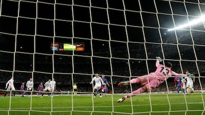 Pedri scores Barcelona's first goal against Sevilla. Reuters