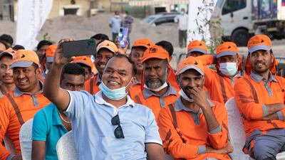 Workers attend an event held in their honour to celebrate International Labour Day in Al Quoz, Dubai. All photos: Ruel Pableo / The National