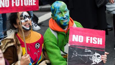 Extinction Rebellion protesters rally in Trafalgar Square in London, Britain, October 7, 2019. EPA/VICKIE FLOR