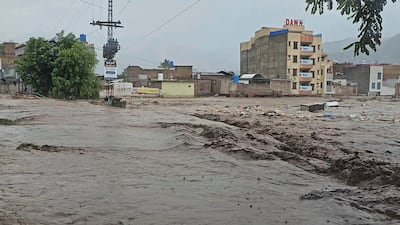A river overflowing in Mingora. AP