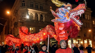 People perform with dragon as they celebrate the Chinese Lunar New Year in Lviv, Ukraine. Mykola Tys / EPA