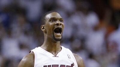Miami Heat centre Chris Bosh reacts during Game 4 of the Eastern Conference finals on Monday night. Wilfredo Lee / AP / May 26, 2014