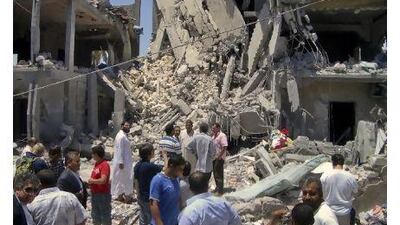 The remains of a damaged residential building in Tripoli, Libya. The Libyan government accused Nato of bombing a residential neighbourhood in the capital and killing civilian. Adam Schreck / AP Photo
