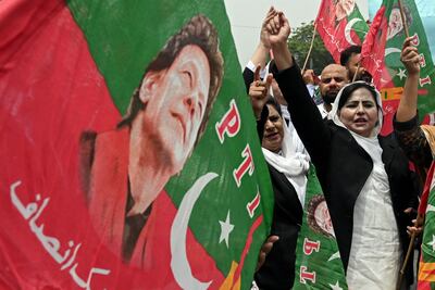 Lawyers supporting Pakistan's former prime minister Imran Khan denounce his arrest during a protest in Lahore on August 7. A three-year jail sentence has raised questions about his eligibility to contest a general election and angered his many supporters. AFP
