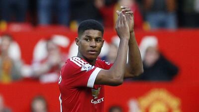 Manchester United's Marcus Rashford applauds their fans after the match against Arsenal, in which he scored two goals. Reuters / Phil Noble