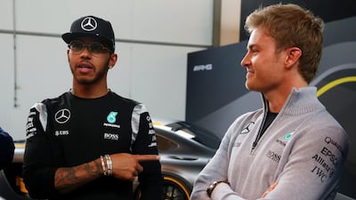 Lewis Hamilton, left, trails teammate Nico Rosberg after finishing behind his Mercedes teammate at the Australian Grand Prix. Alexander Hassenstein / Getty Images