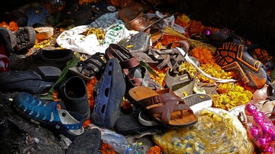 Footwear of the victims of a stampede are seen below a railway station's pedestrian overbridge in Mumbai, India. Shailesh Andrade / Reuters