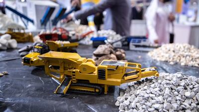 Models of impact crushers, which crush rocks at high speed, on display at the WBG stall at the conference.