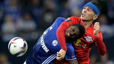 Breel Embolo of Schalke, left, and Jonatan Soriano of Salzburg battle for the ball during the Uefa Europa League in Gelsenkirchen, Germany. Sascha Steinbach / Bongarts / Getty Images