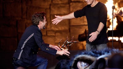 Musician Eddie Van Halen accepts the Guitar God award from actor Robert Downey Jr. onstage at Spike TV's 2009 "Guys Choice Awards" held at the Sony Studios on May 30, 2009 in Los Angeles, California. AFP