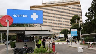 Security staff at the entrance to the Gomez Ulla Military Hospital in Madrid, where 14 Spanish citizens from the MV Hondius are to be quarantined. Reuters