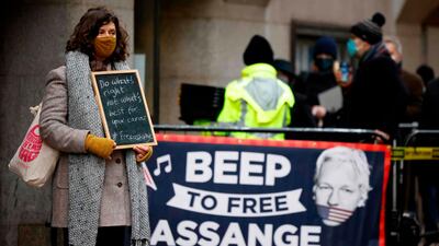 Supporters of Wikileaks founder Julian Assange demonstrate outside the Old Bailey. AFP