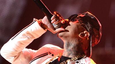 LOS ANGELES, CA - JULY 01: Recording artist Tyga performs onstage during the 2012 BET Awards at The Shrine Auditorium on July 1, 2012 in Los Angeles, California. Michael Buckner/Getty Images For BET/AFP