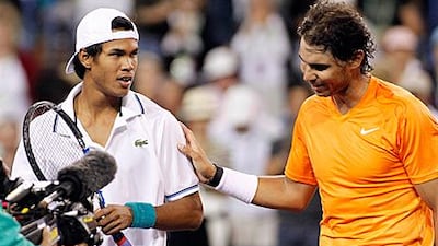 Rafael Nadal, right, pats Somdev Devvarman after beating him in the fourth-round of the BNP Paribas Open in California.