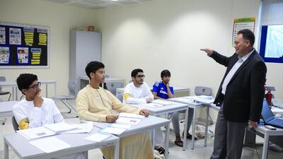 Robert Anderson, a curriculum specialist in business, teaches a customer service and merchandising class as part of the Yes to Work programme at the Institute of Applied Technology in Dubai. Sarah Dea / The National