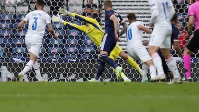 Patrik Schick of the Czech Republic scores his team's first goal against Scotland. EPA