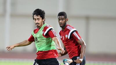 Khalfan Mubarak, left, of the UAE takes part in a training session on Monday prior to the team’s trip to Seoul. Photo Courtesy UAE FA